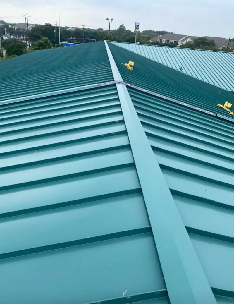 Green commercial metal roof ridge and valley for Metal Roof Repair in Kirtland