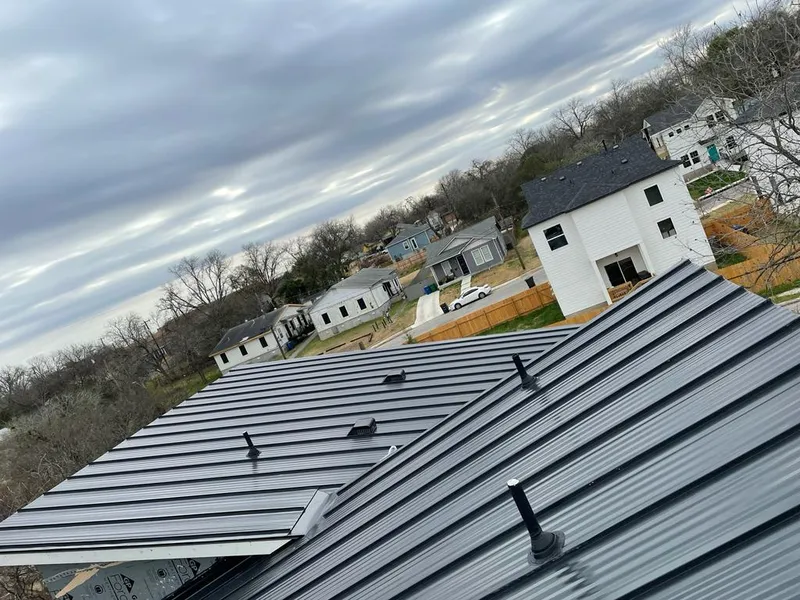 Standing seam metal roof panels with vents for Skylight Repair in Kirtland